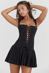 black pleated mini dress