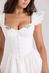 white cotton embroidered mini dress