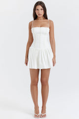 white pleated mini dress